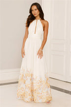 The Meadow’s Secret Halter Maxi Dress Yellow